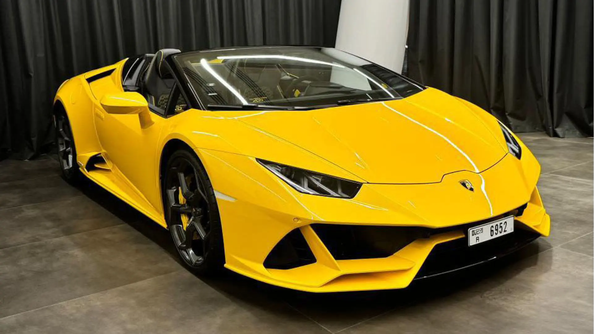 hire Lamborghini Huracan Evo Spyder Yellow in dubai