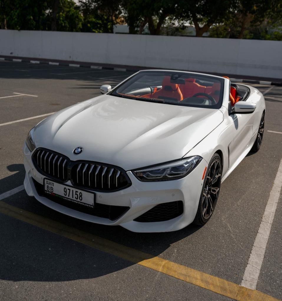 hire BMW 840i Convertible White without Deposit in dubai